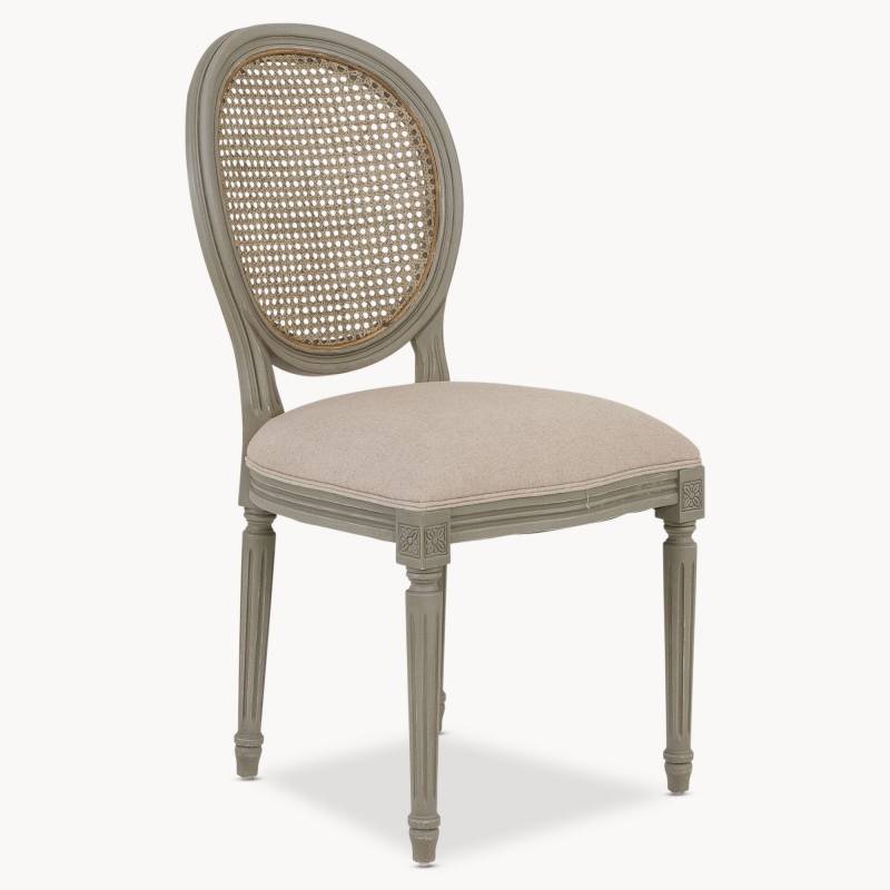 Wicker backed dining chairs with distressed grey paint finish. £345 each