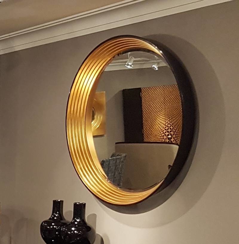 A contemporary mirror available with gilt of silvered stepped inner bezel. 112cms diameter x 12cms deep. £1,380